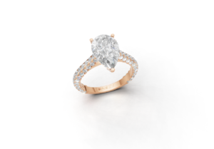 18K Gold Pear and Round Diamond Ring 18K Gold Pear and Round Diamond Ring
